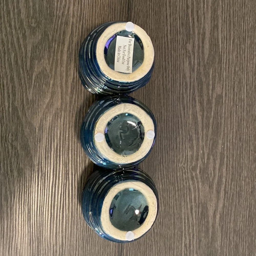 Decorative  clay, metallic blue container. 3 combined vases/cups.